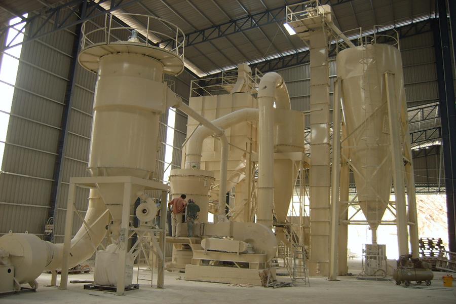 What kind of grinding machine equipment is used in the production of desulfurized gypsum powder